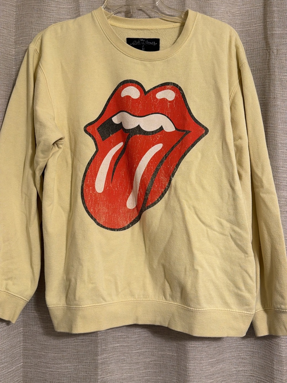 the Rolling Stones Yellow Crewneck Sweatshirt with Red Tongue Graphic